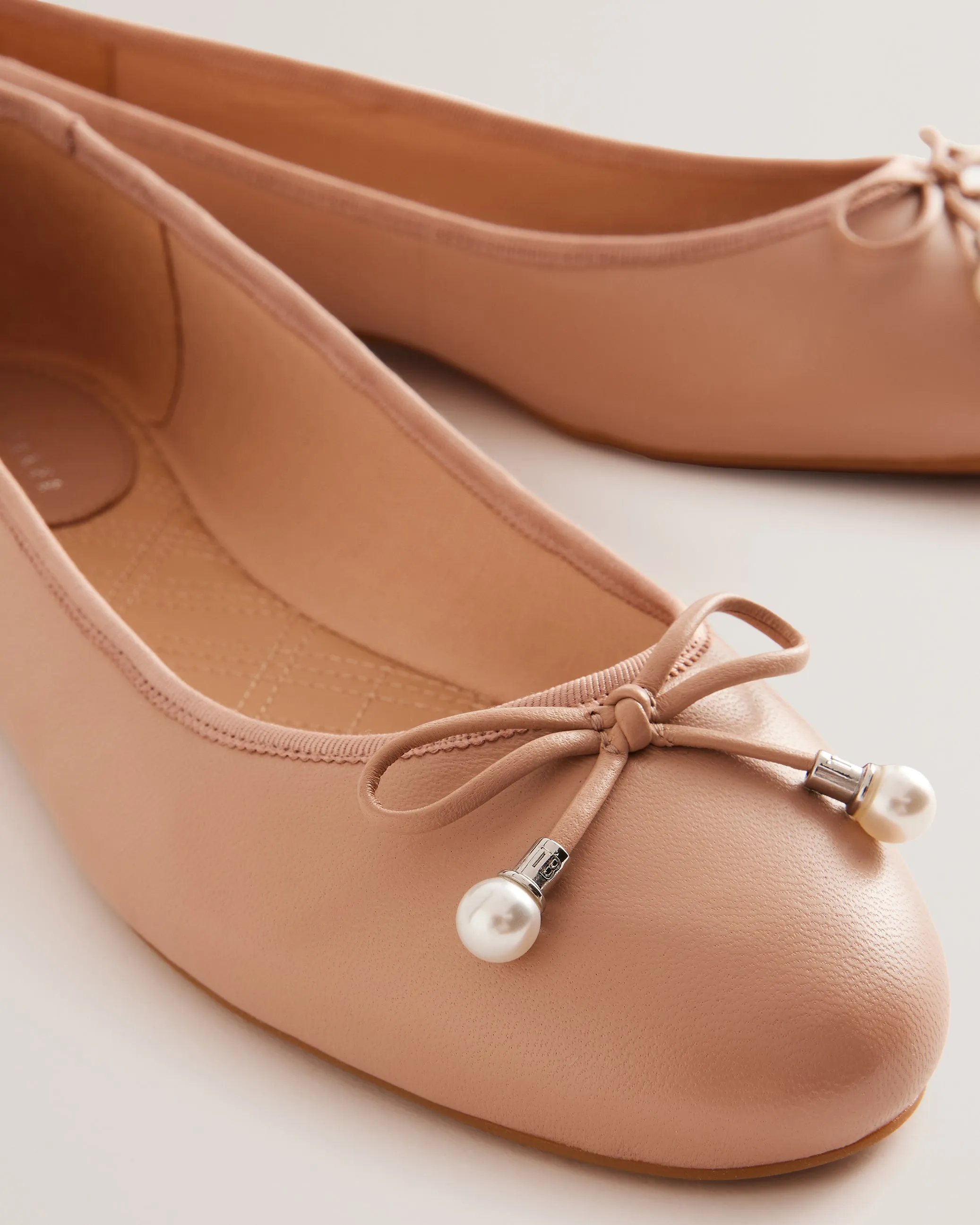 Ayvvah Flat Bow Ballerina Shoe With Signature Charm Pink